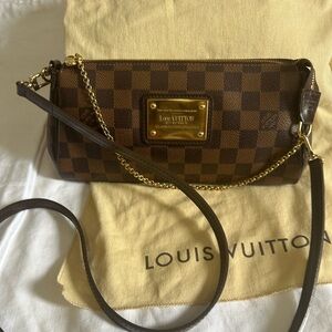 Authentic Louis Vuitton Eva clutch bag